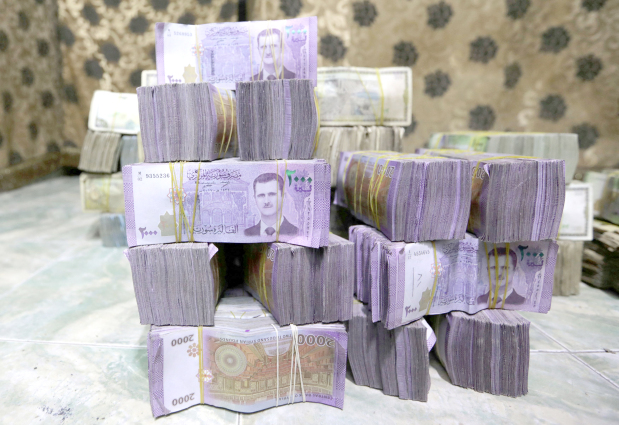 Syria ‘to revalue currency’